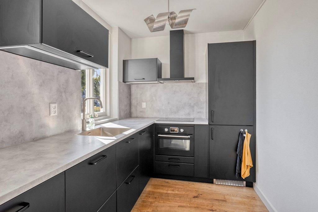 Tussenwoning te koop: Newtonlaan 52, Vlijmen
