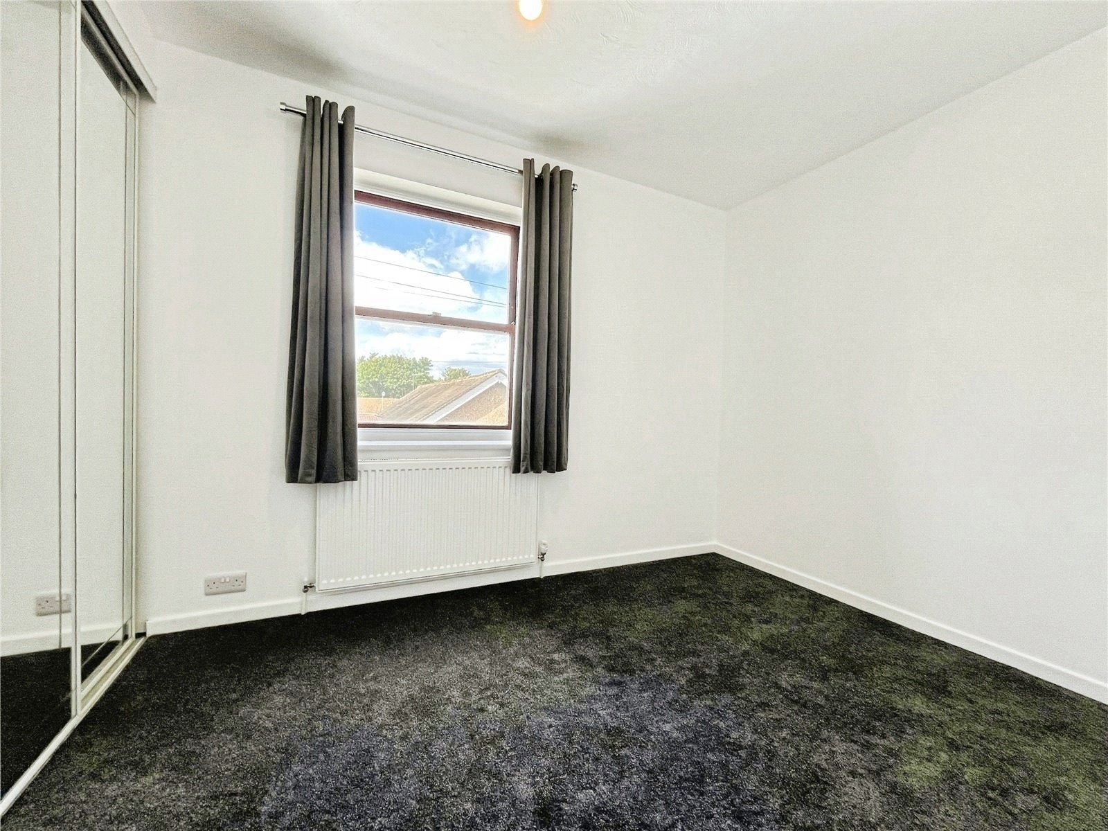 Flat Rusham Road in Borough of Runnymede