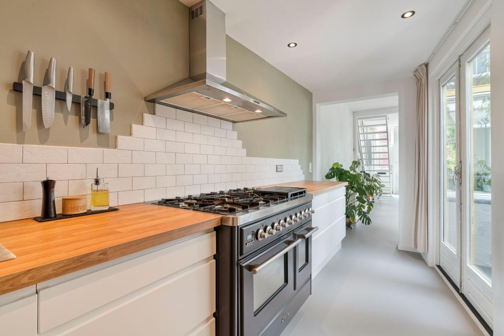 Tussenwoning te koop: Dirklangendwarsstraat 12, Delft