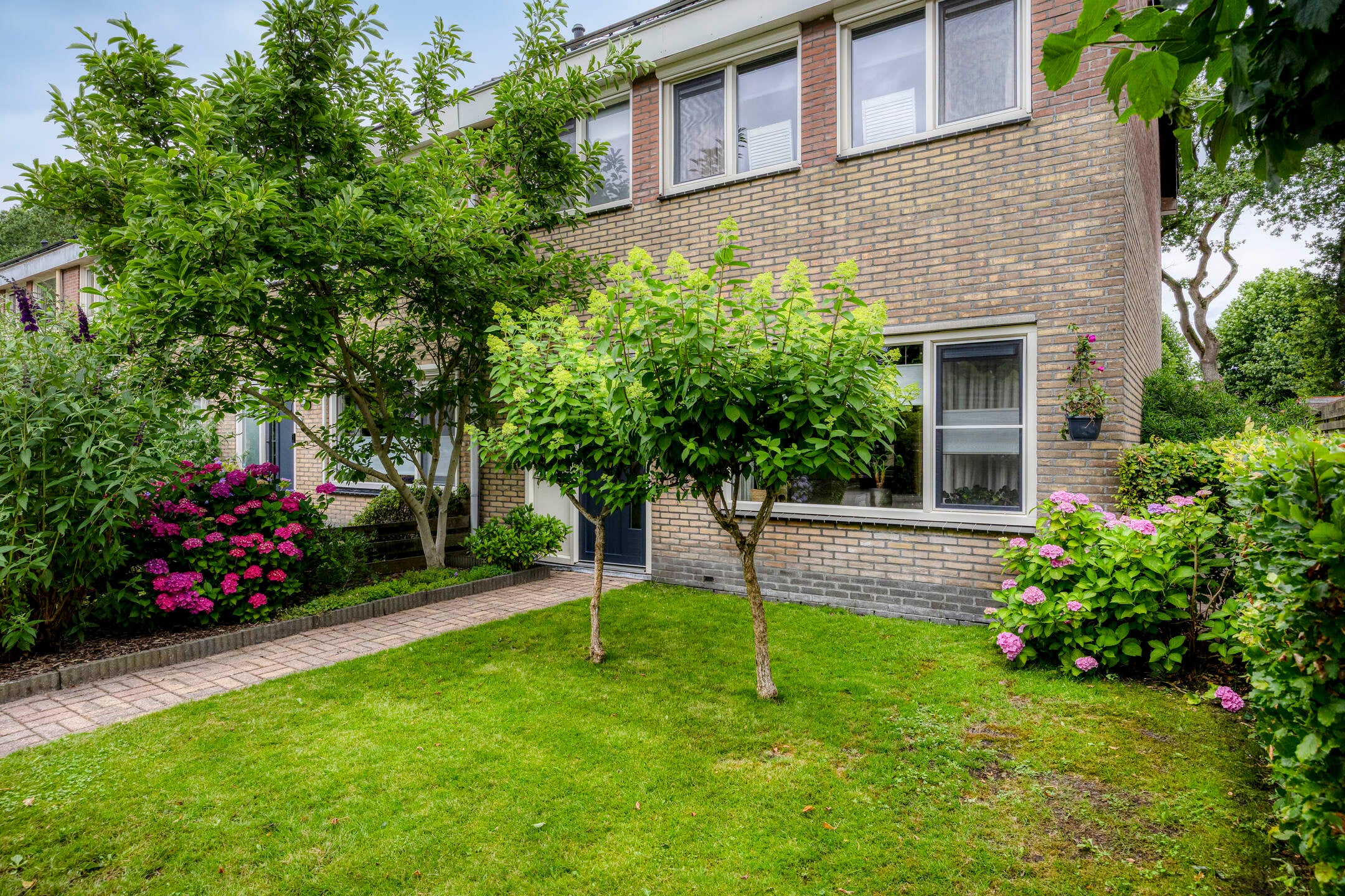 Huis Meester Voortmanstraat 64 in Haulerwijk