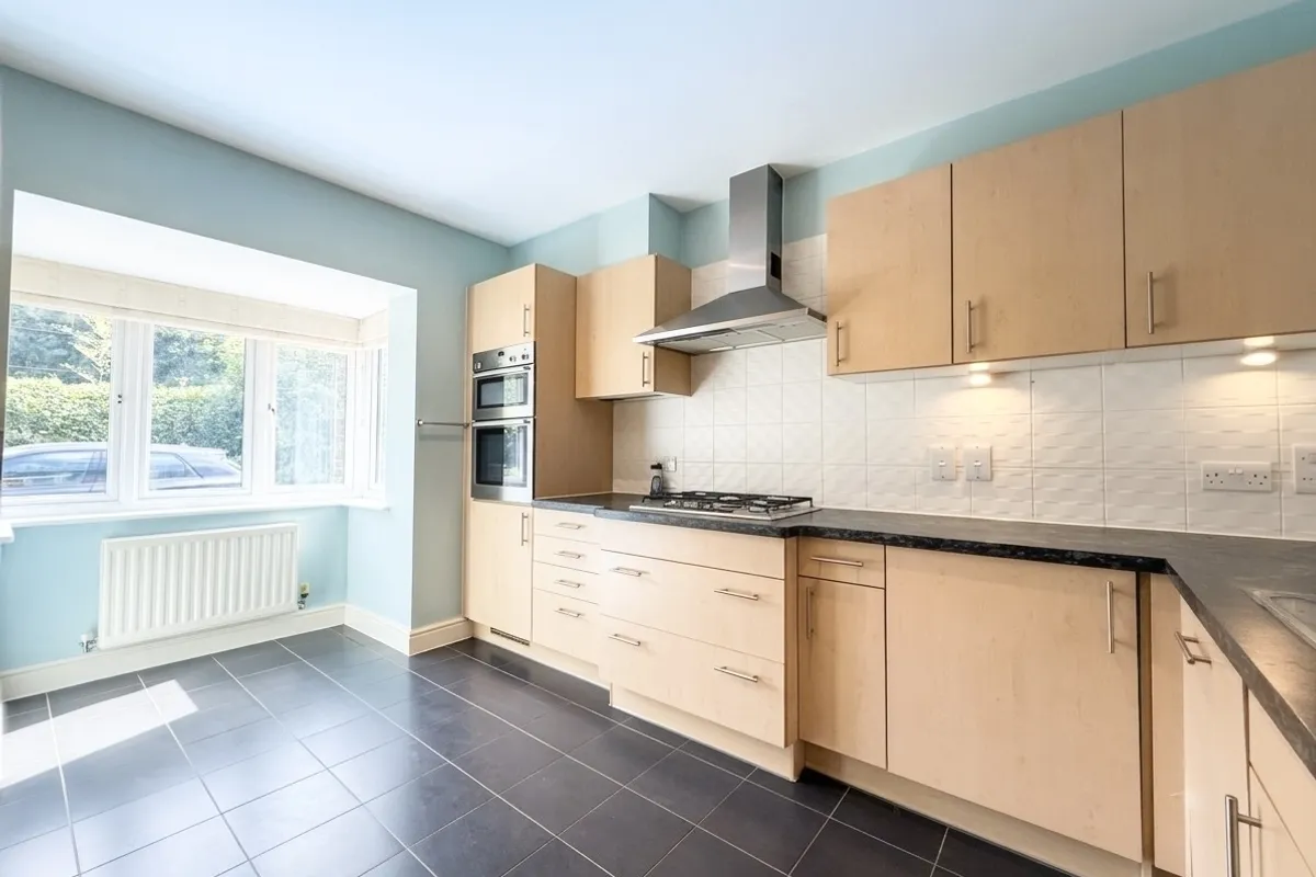 House Nower Close East in Mole Valley