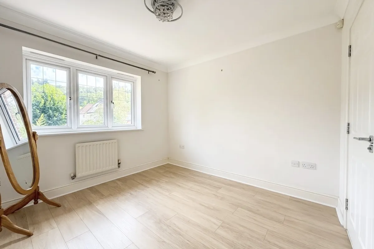 House Nower Close East in Mole Valley