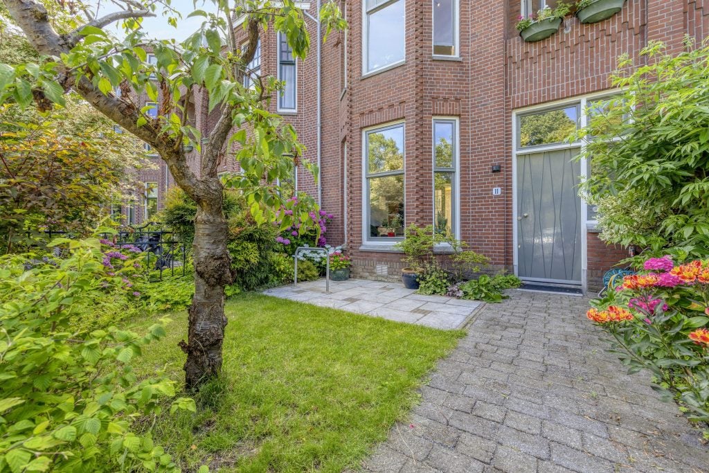 Tussenwoning te koop: Tweemolentjeskade 11, Delft