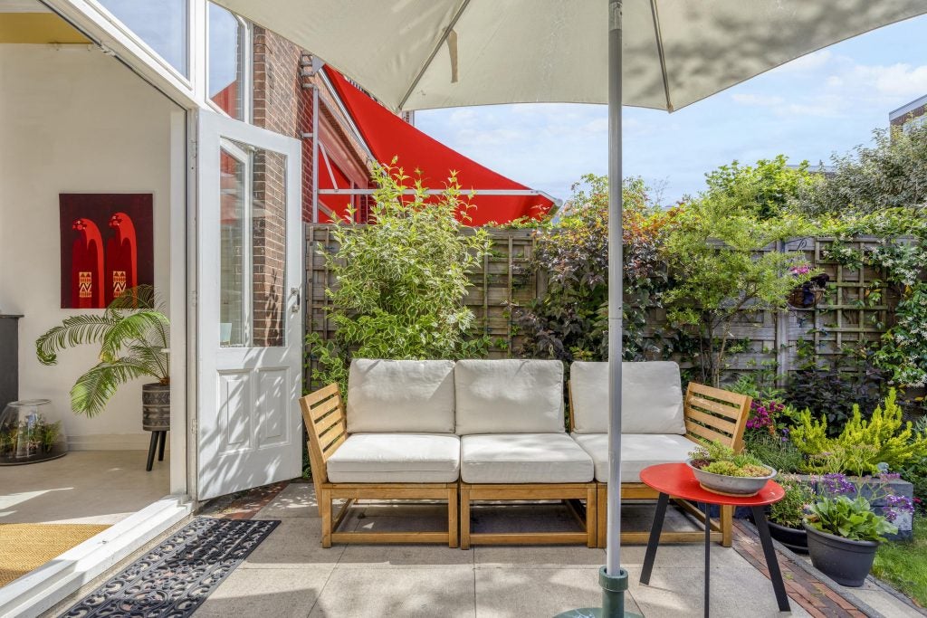 Tussenwoning te koop: Tweemolentjeskade 11, Delft