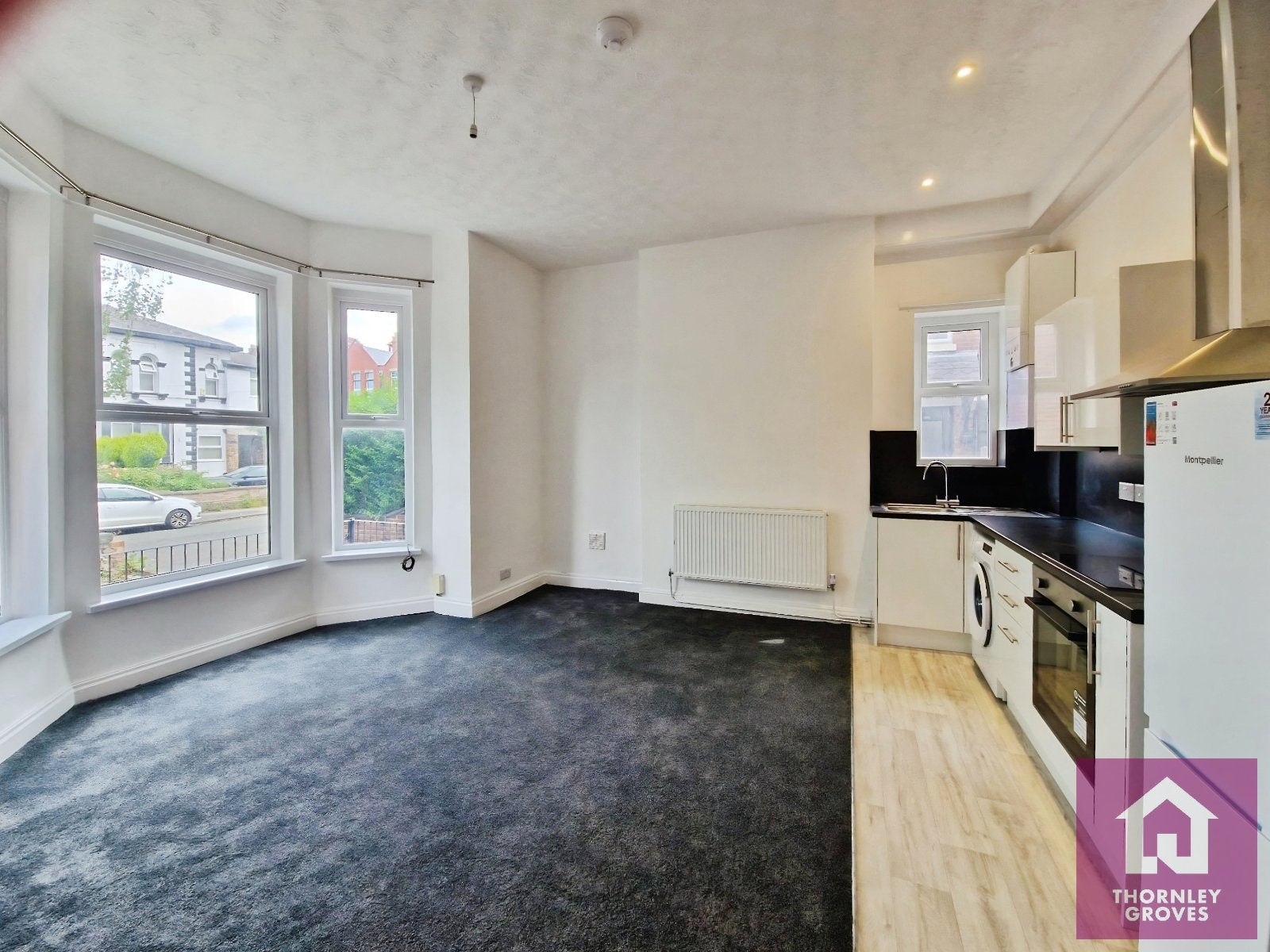 Flat Belgrave Crescent in Manchester
