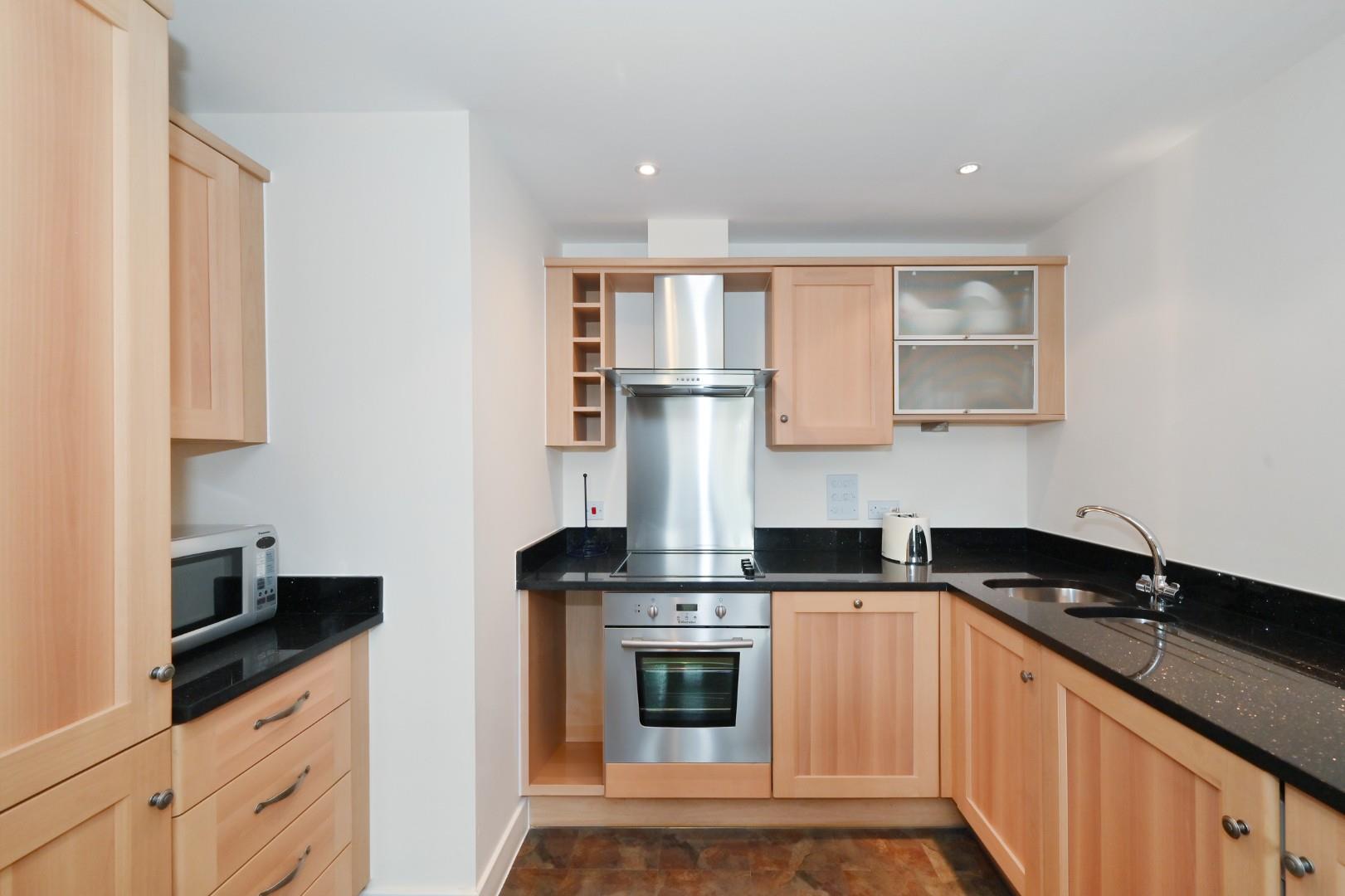 Flat Highbury Drive in Mole Valley