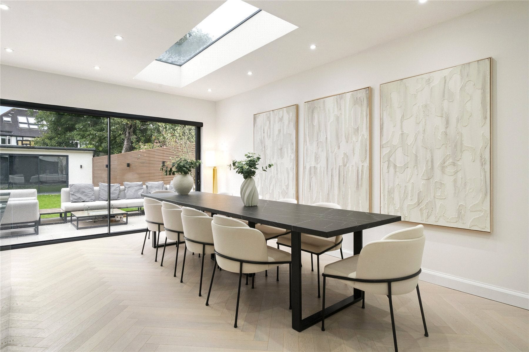 House Couchmore Avenue in Elmbridge