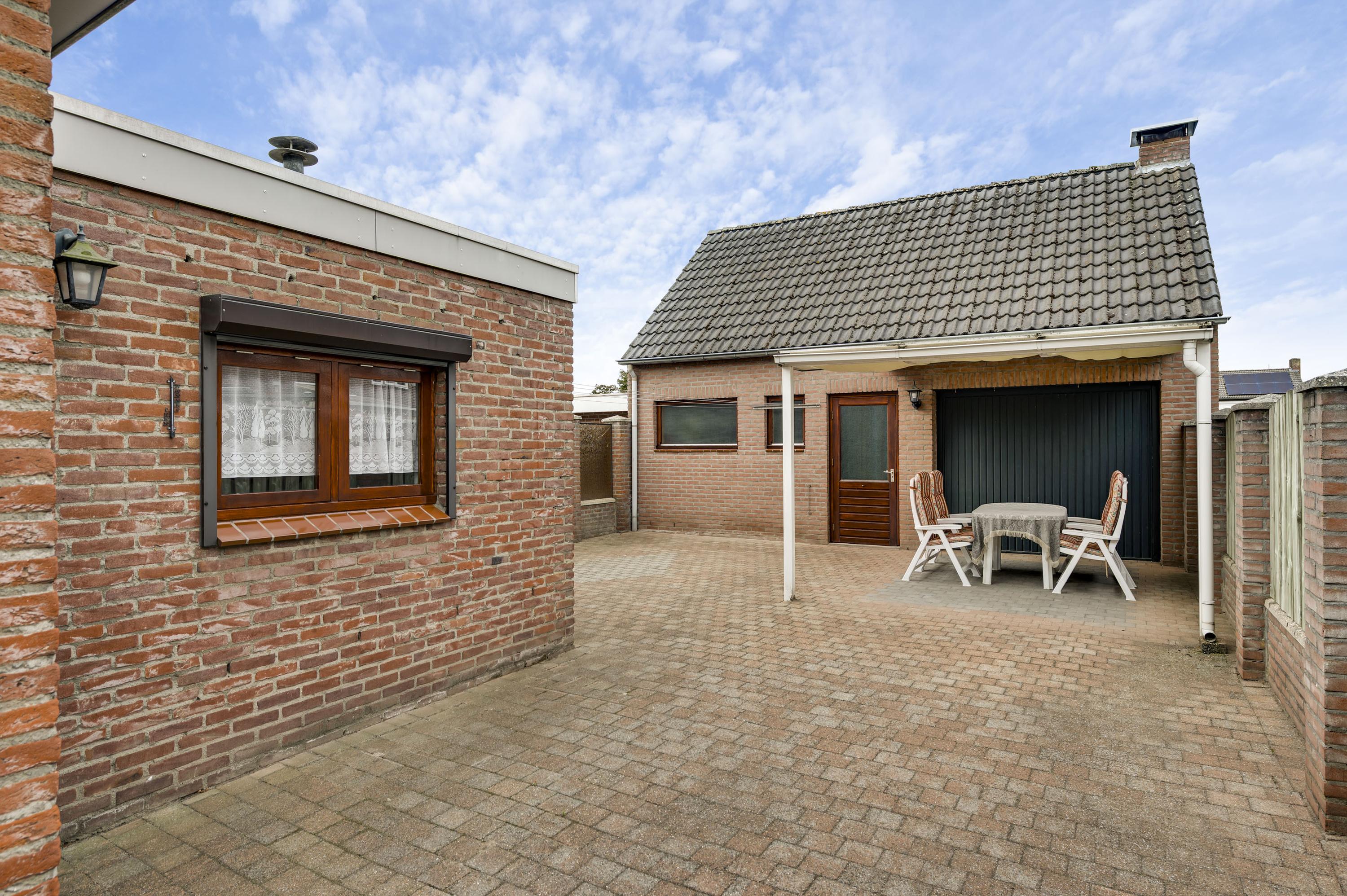 Hoekwoning te koop: Tuindorpstraat 4, Weert
