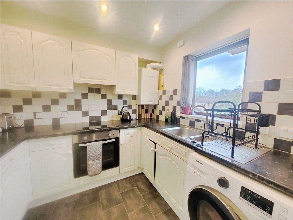Flat Trumps Green Road in Borough of Runnymede