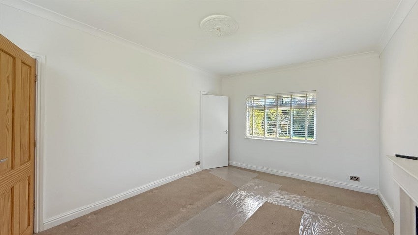 Flat Raikes Road in Farnworth