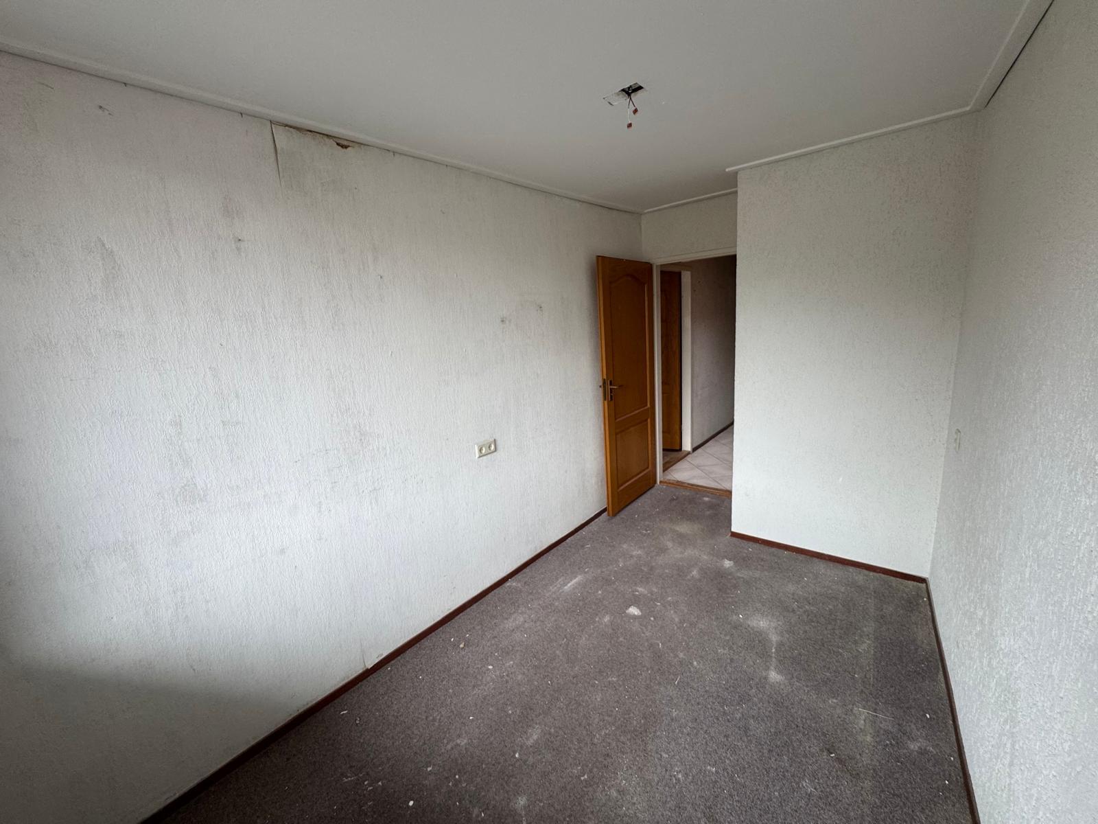 Tussenwoning te koop: Weeshuisstraat 27, Coevorden
