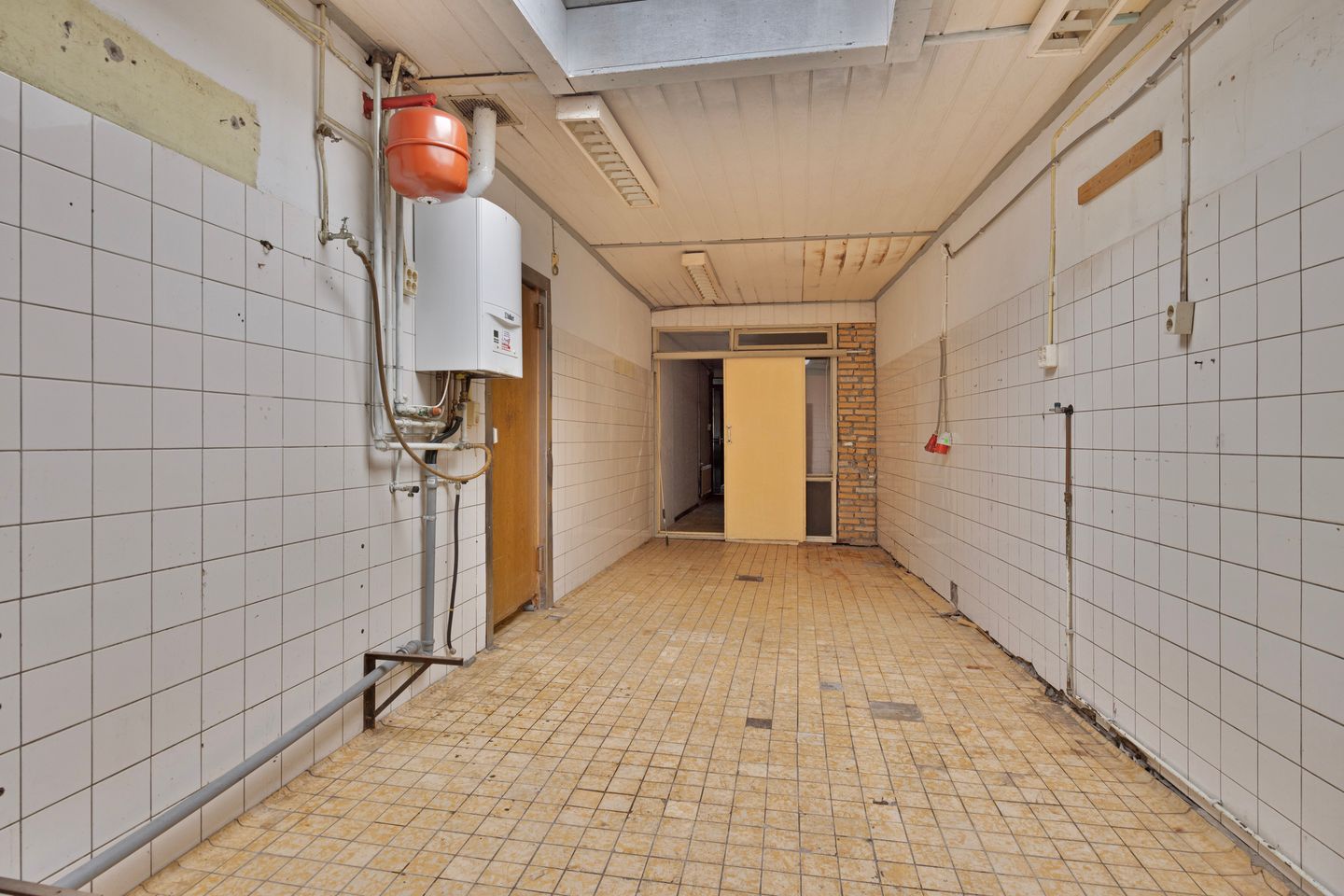 Tussenwoning te koop: Weeshuisstraat 27, Coevorden