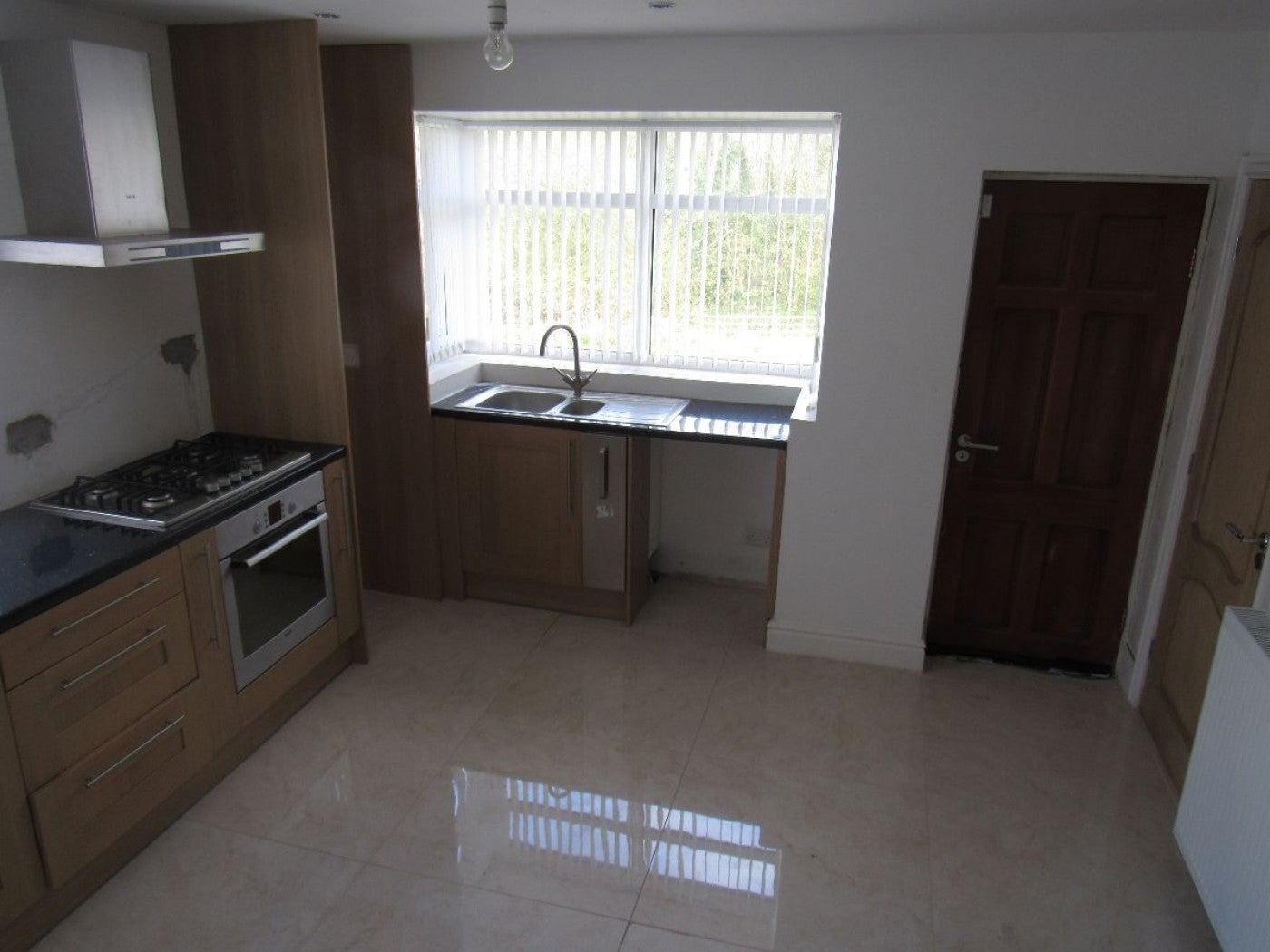 Flat Woodside Avenue in Preston