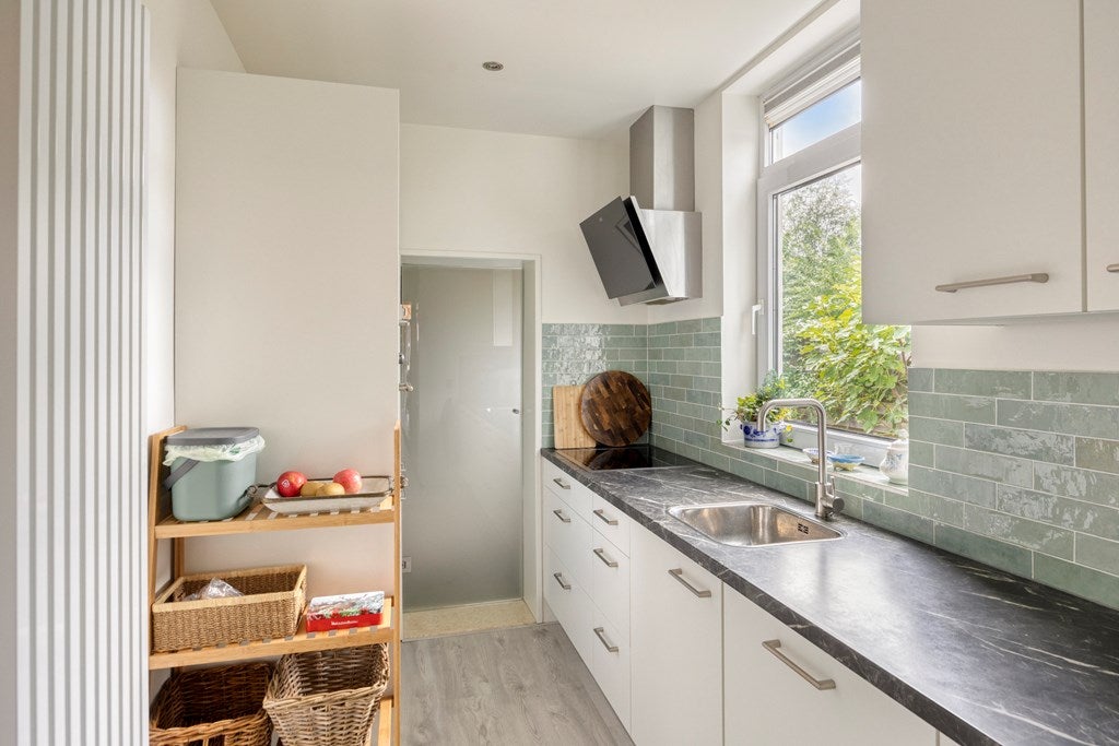 Tussenwoning te koop: Oostsingel 34, Schiedam