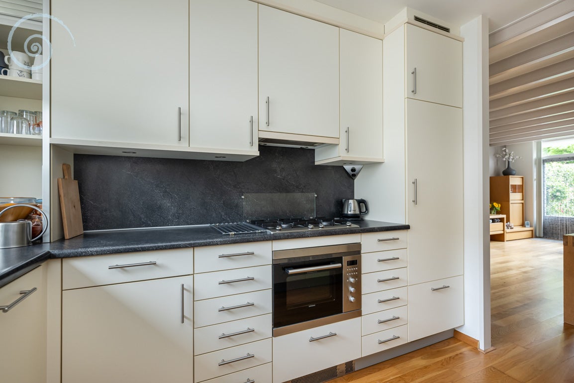 Tussenwoning te koop: Nassaustraat 10, Den Bommel