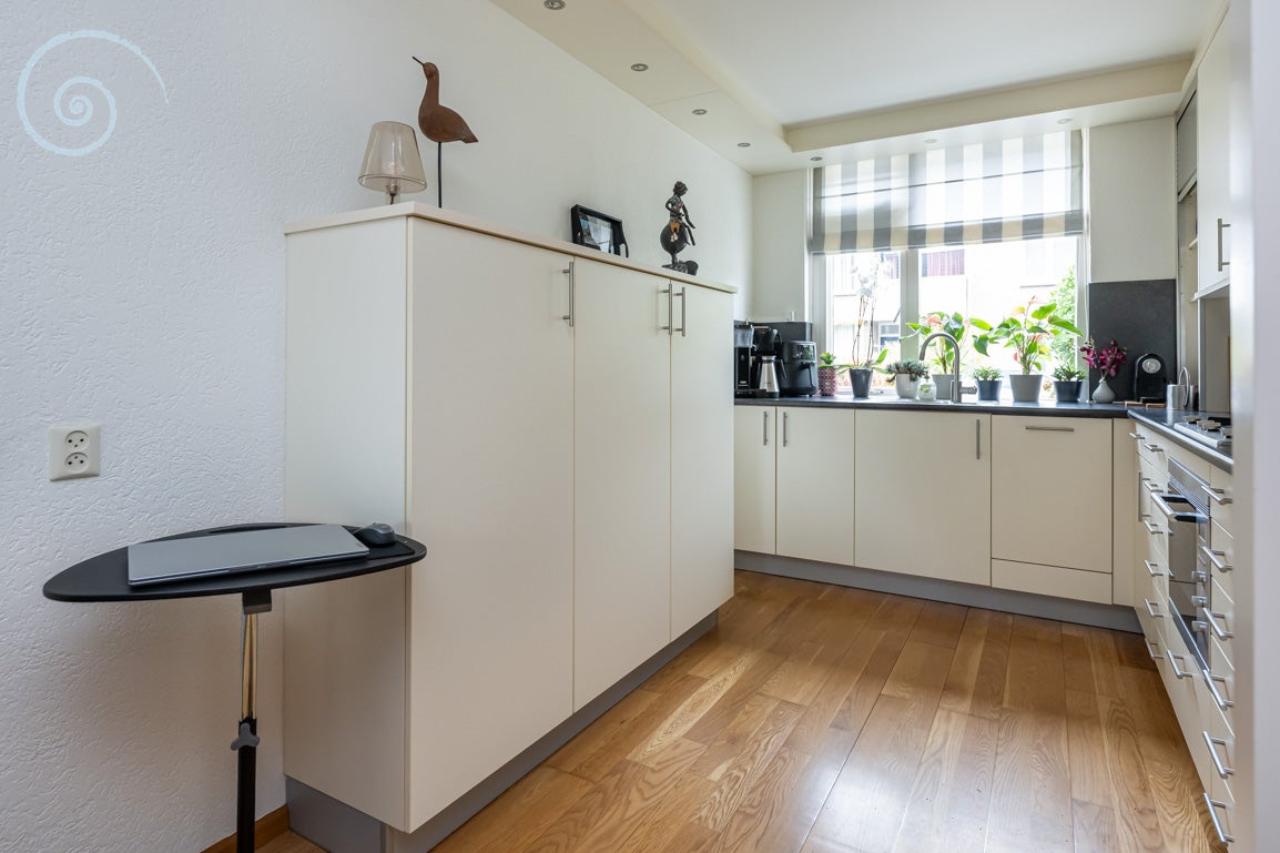 Tussenwoning te koop: Nassaustraat 10, Den Bommel
