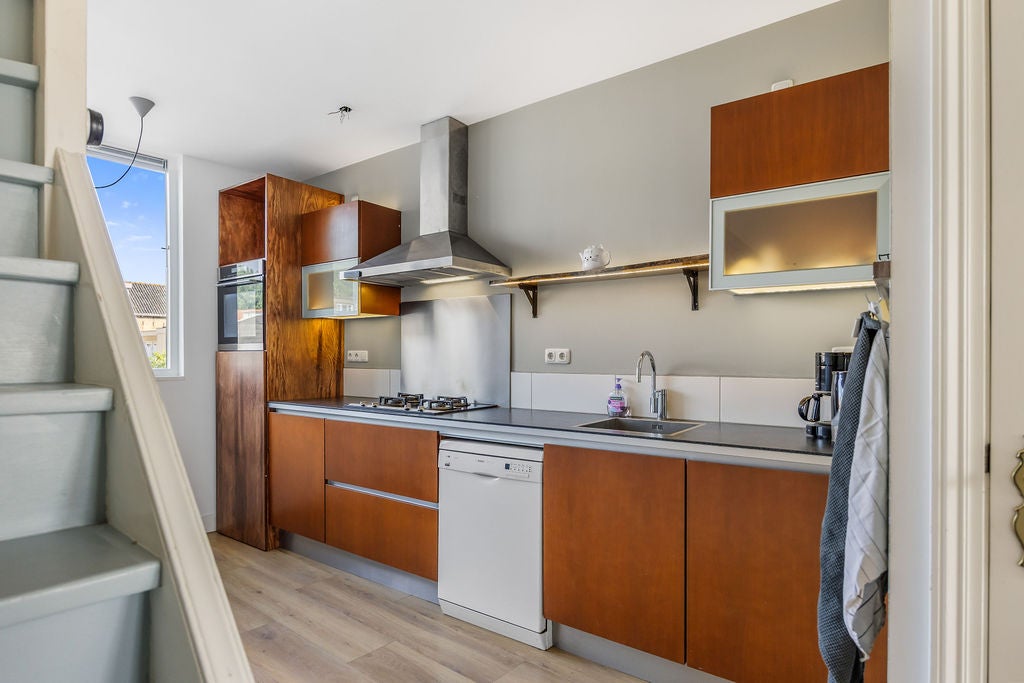 Tussenwoning te koop: Geeuwkade 4, Sneek