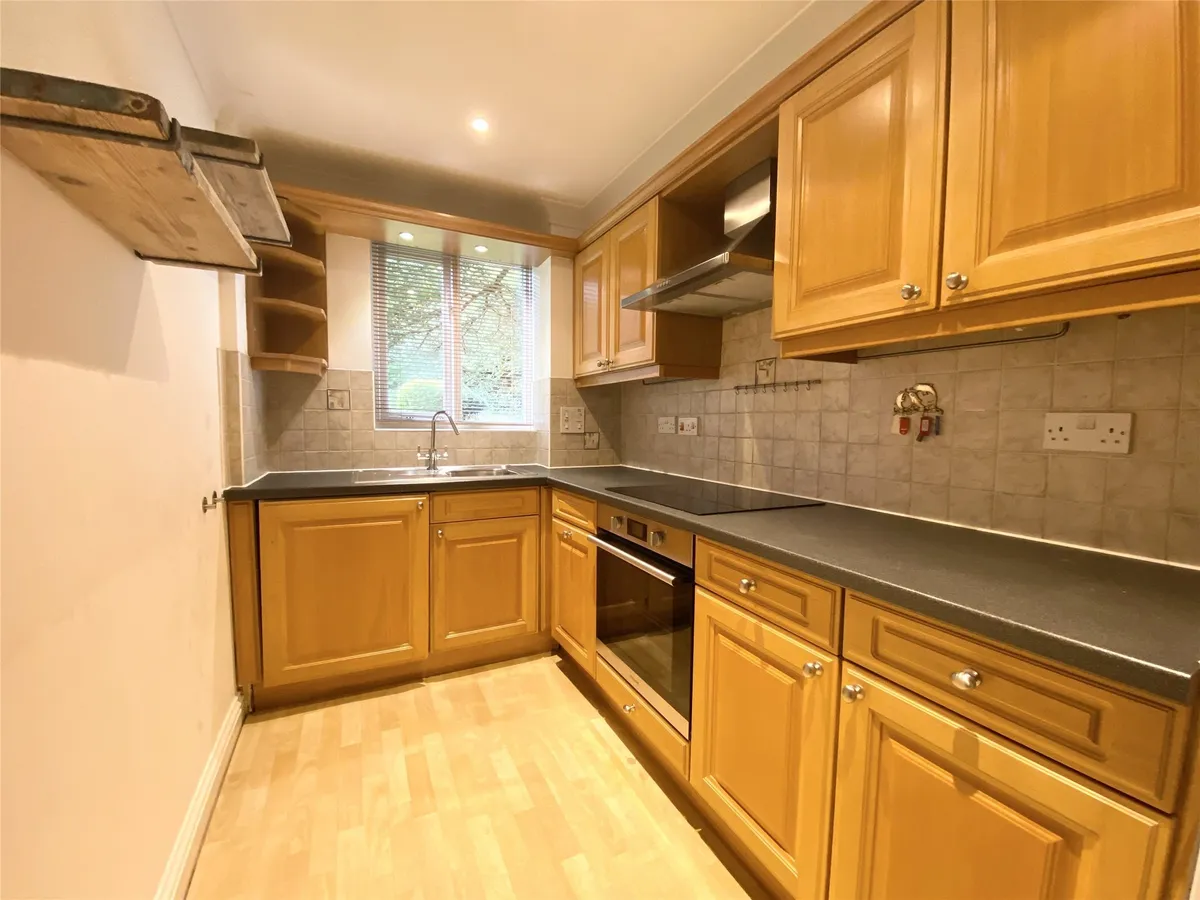 Flat Hawks Hill Court in Mole Valley