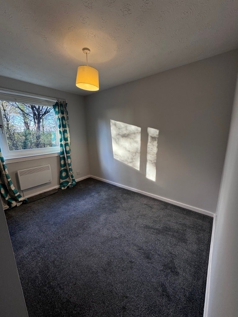 Flat Woodside Road in Tullibody