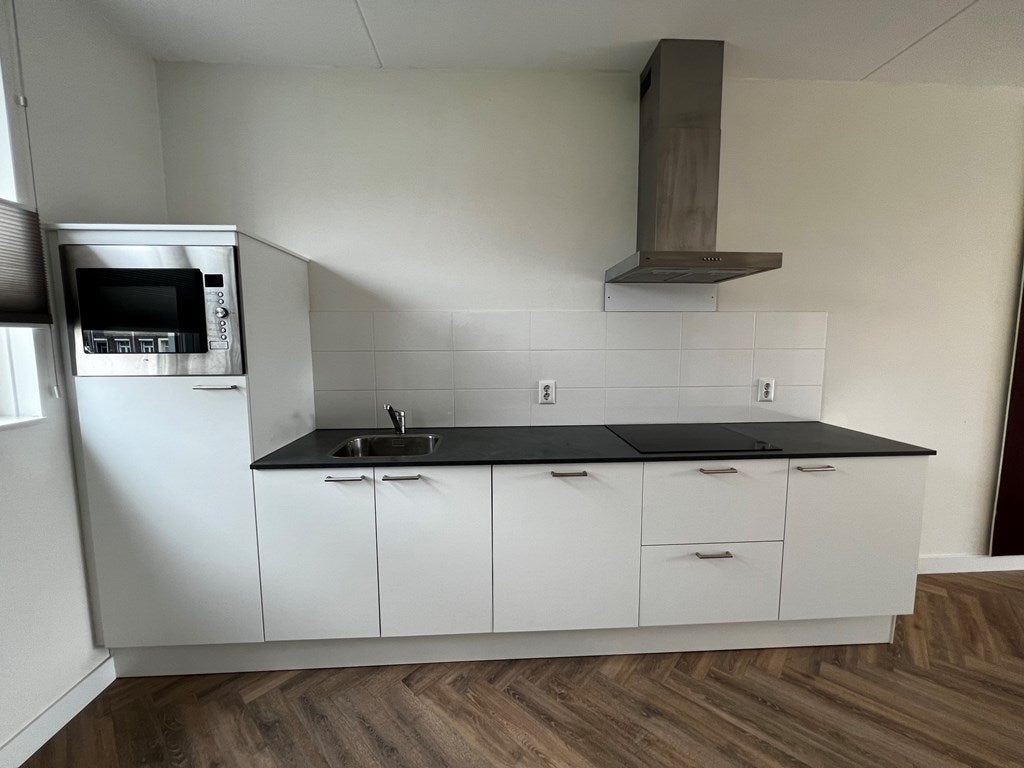 Tussenwoning te huur: Molenweg 19, Roermond