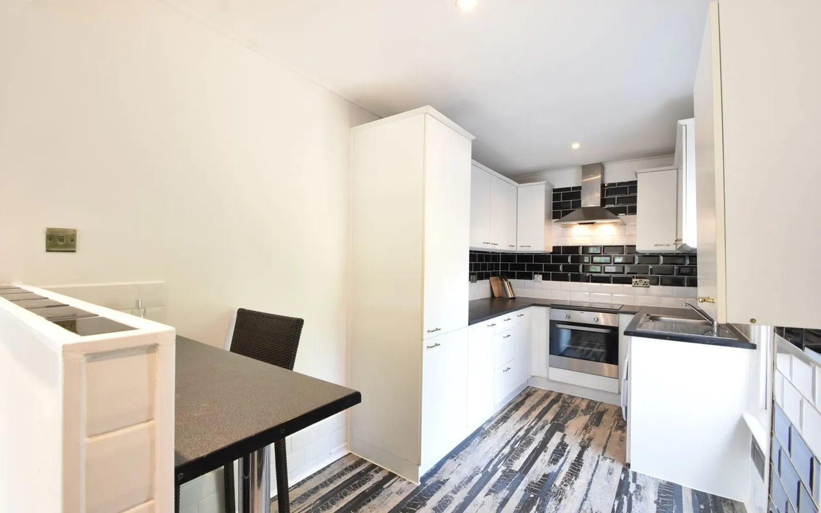Flat Woburn Hill in Borough of Runnymede