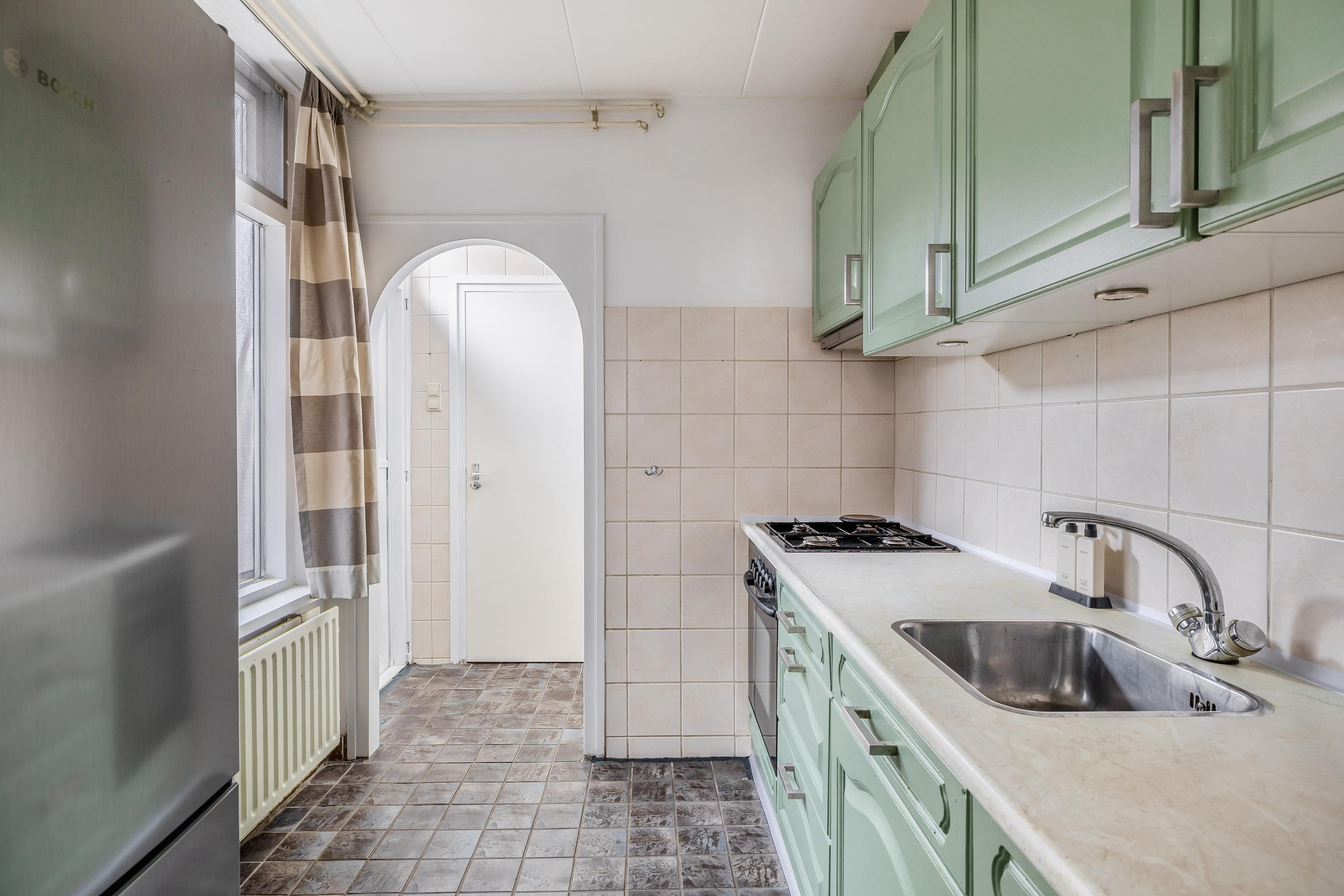 Tussenwoning te koop: Westelijke Achterweg 43, Sommelsdijk