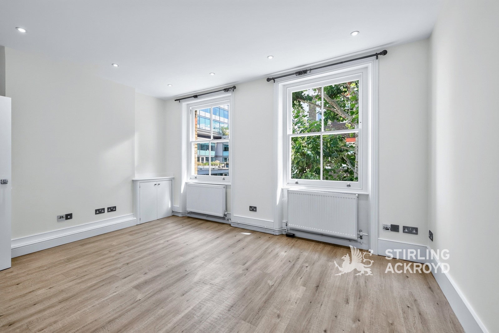 Flat Windmill Street in Greater London