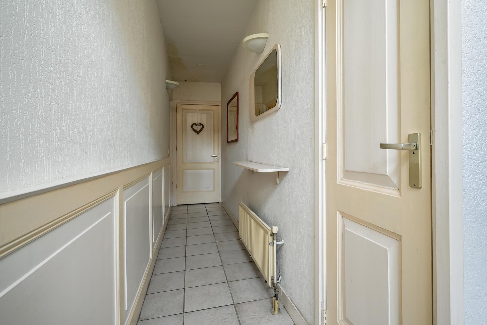 Tussenwoning te koop: Dorpsstraat 24, Bergschenhoek