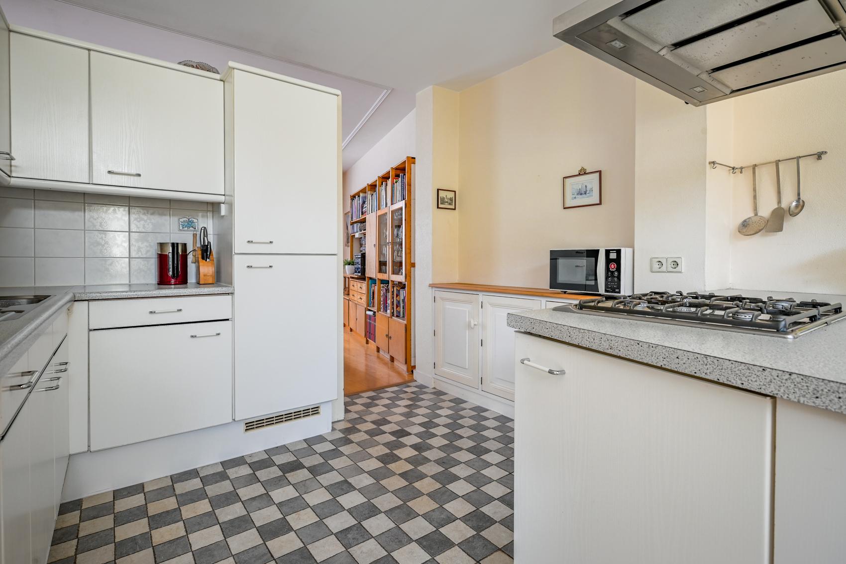 Tussenwoning te koop: Dorpsstraat 24, Bergschenhoek