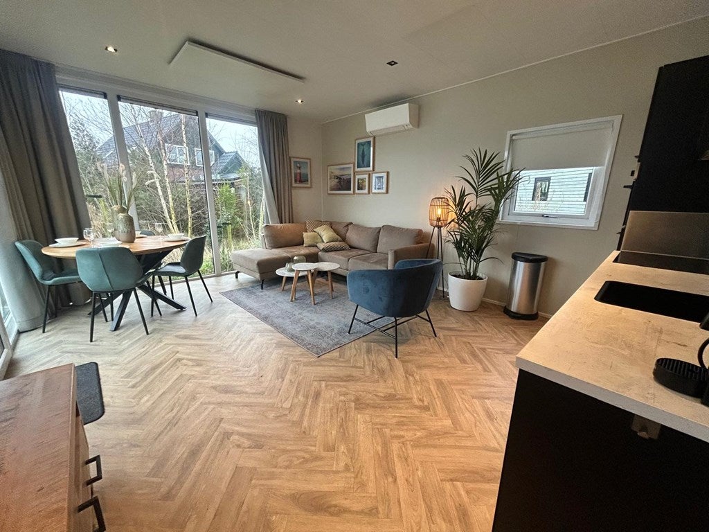 Tussenwoning te koop: Postweg 10-132, De Cocksdorp