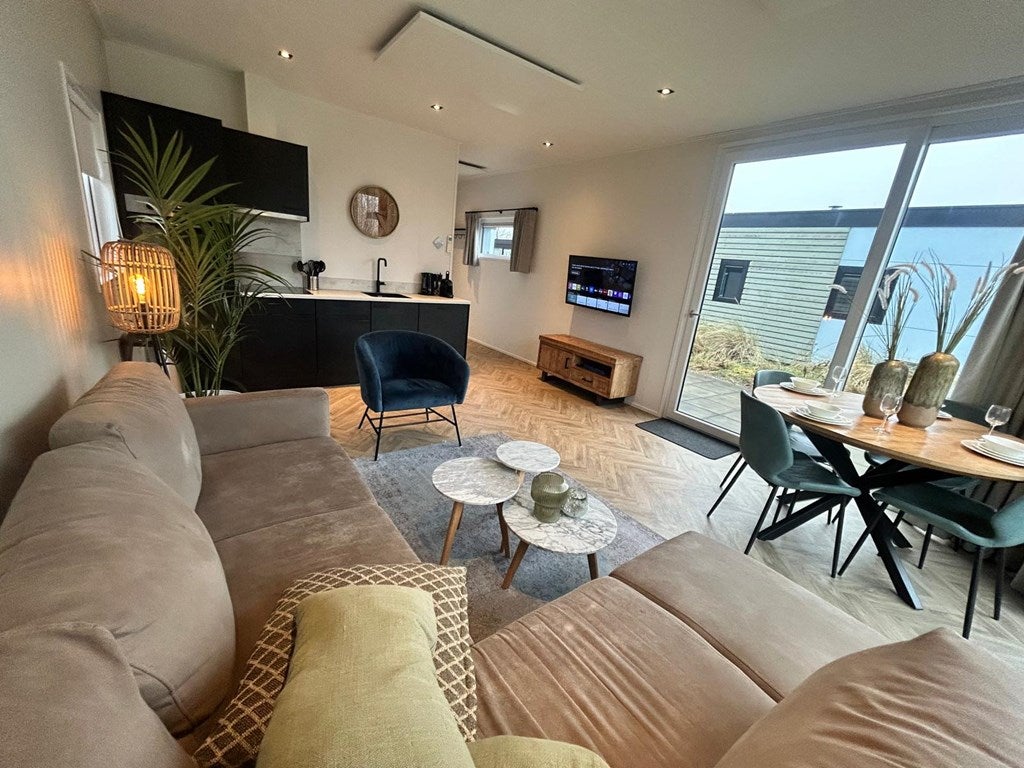 Tussenwoning te koop: Postweg 10-132, De Cocksdorp