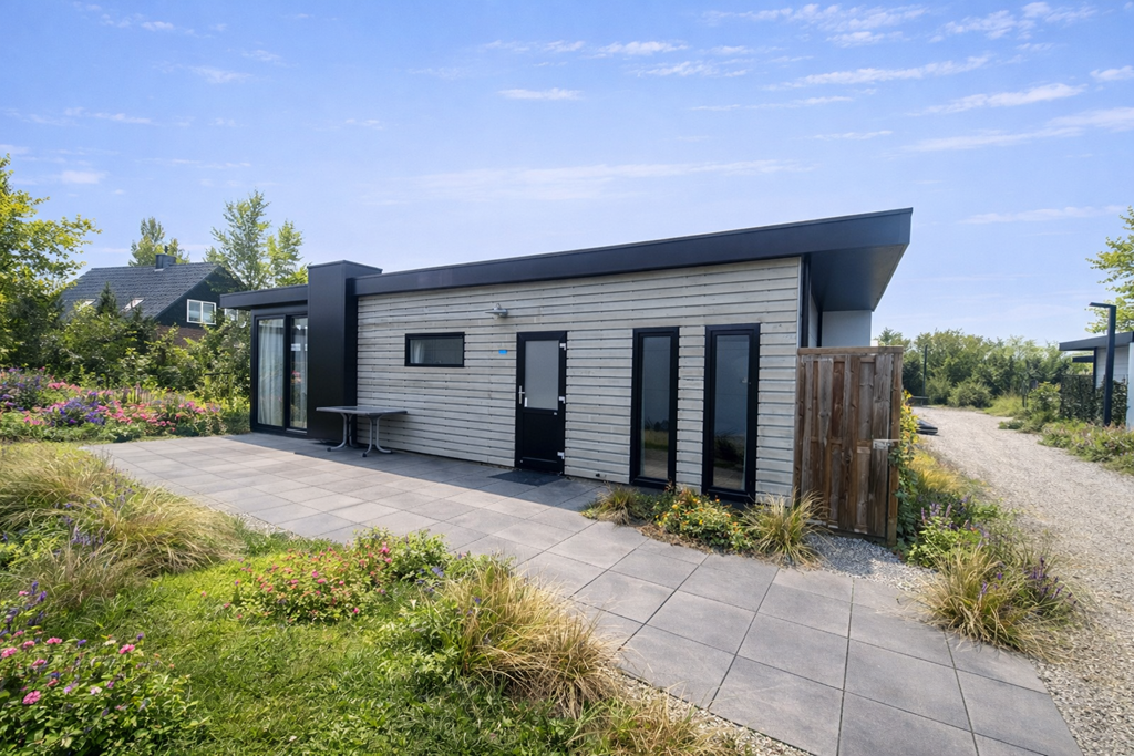 Tussenwoning te koop: Postweg 10-132, De Cocksdorp