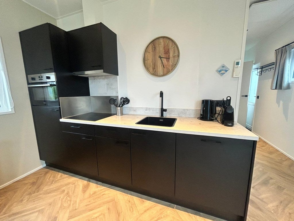 Tussenwoning te koop: Postweg 10-132, De Cocksdorp