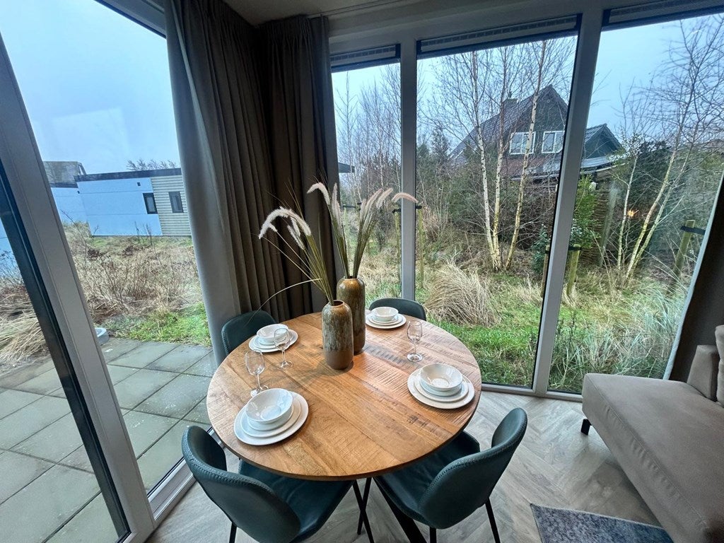 Tussenwoning te koop: Postweg 10-132, De Cocksdorp