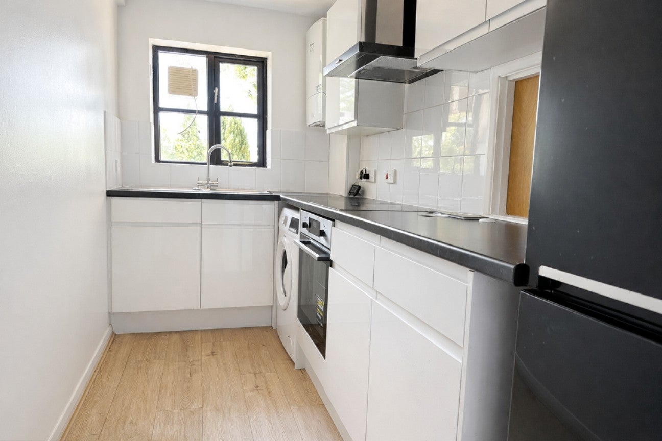 Flat Epsom Road in Mole Valley