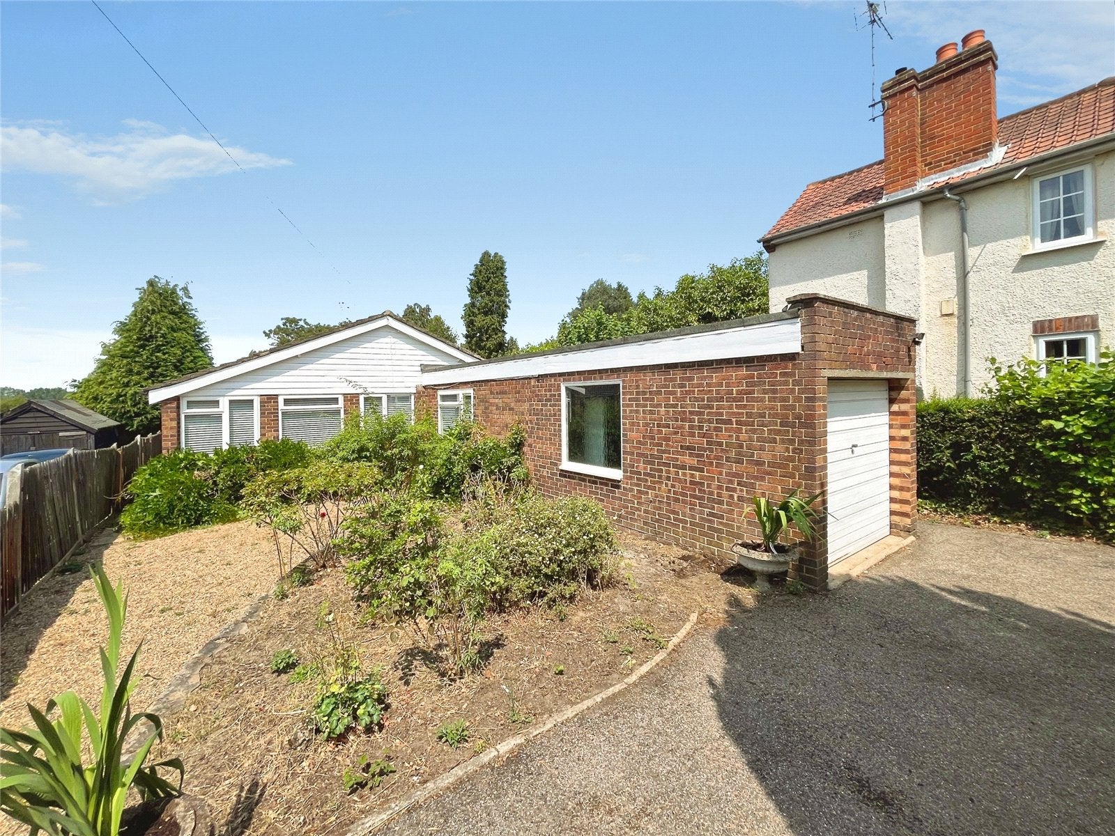 House Sandhills Lane in Borough of Runnymede