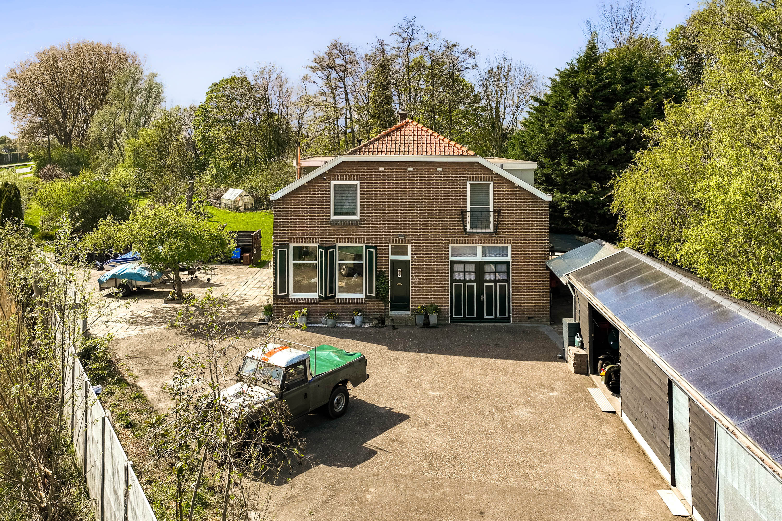 Vrijstaande woning te koop: Groene Kruisweg 475, Rhoon