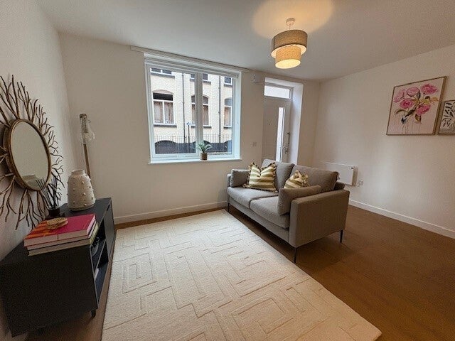 Flat Barnes Drive in Farnworth