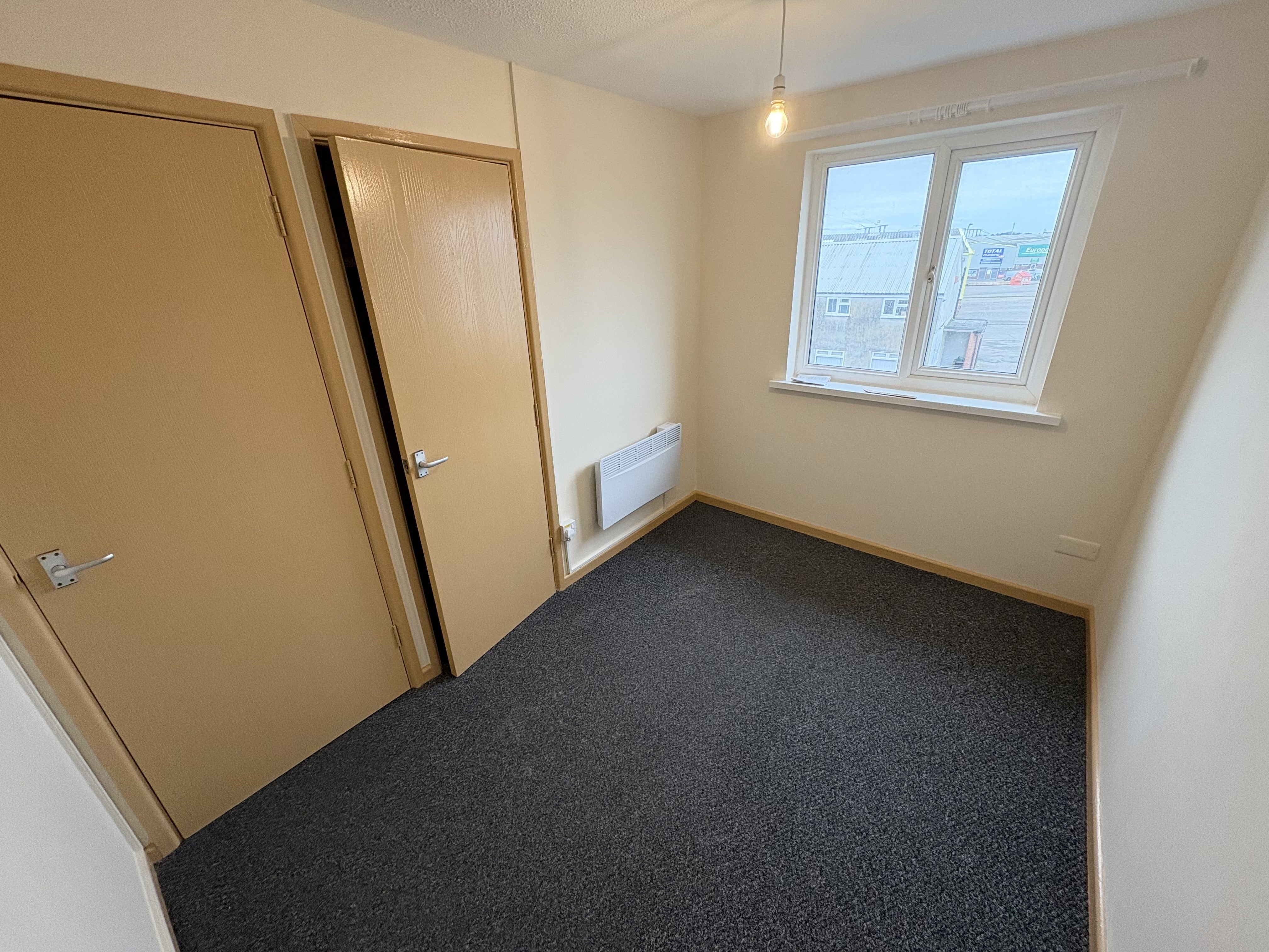 Flat Harlequin Court in Cardiff