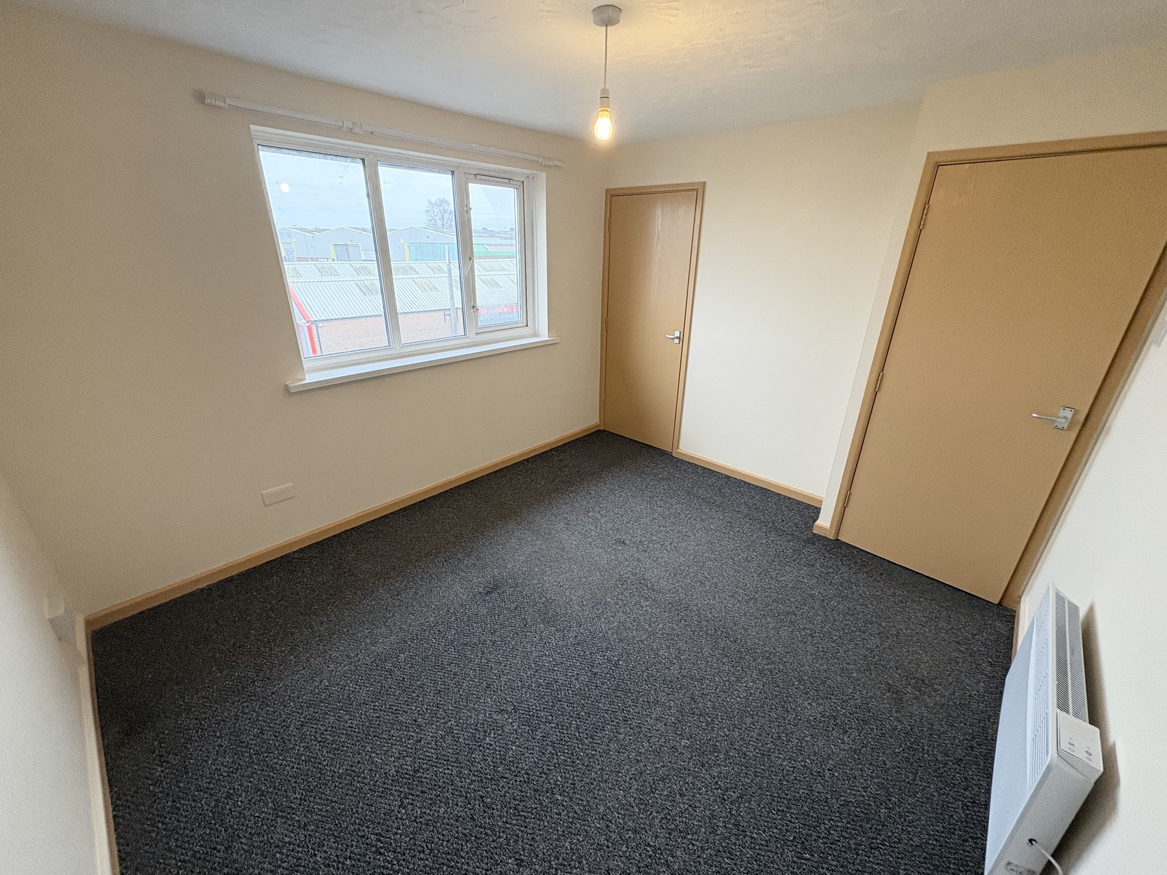 Flat Harlequin Court in Cardiff